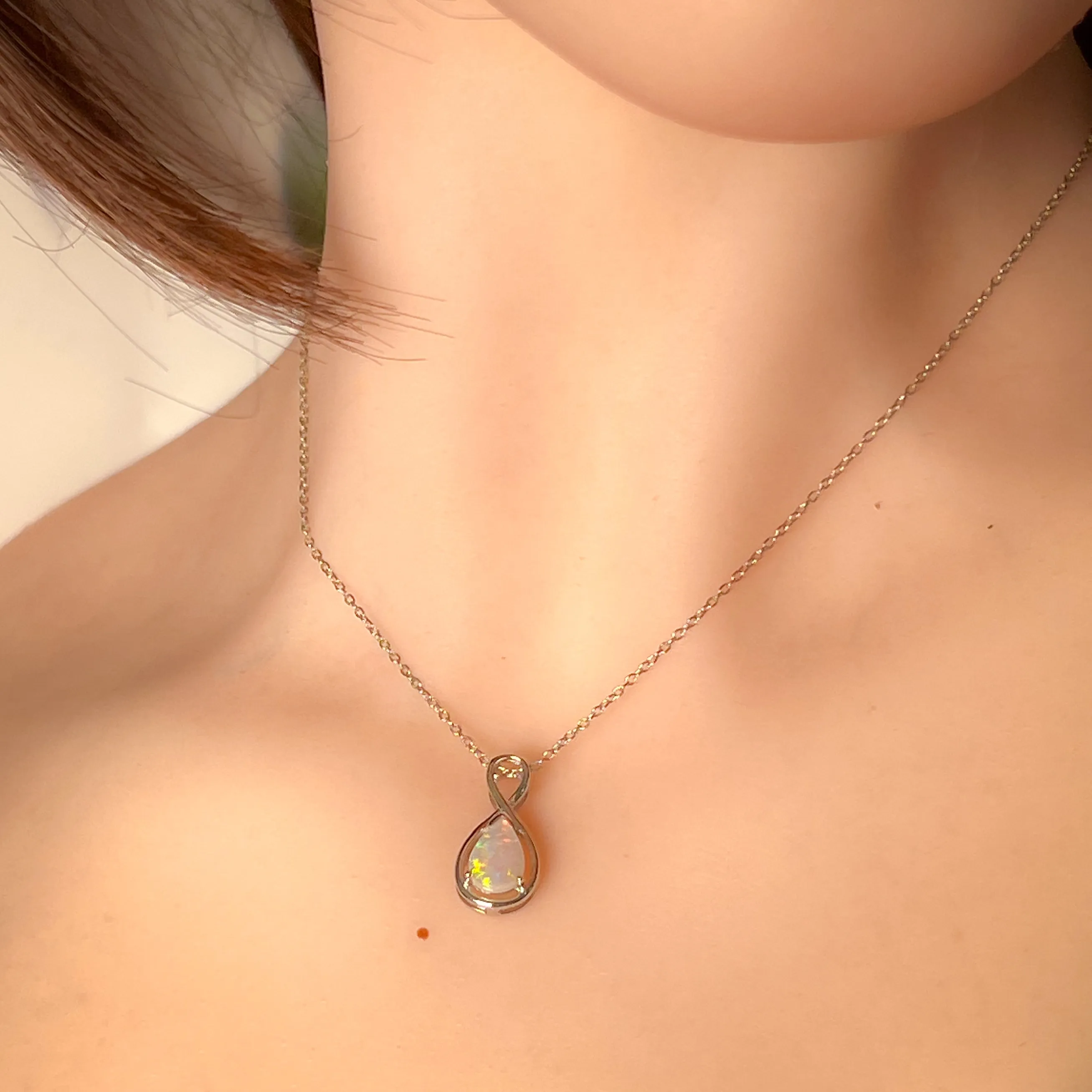 9kt White Gold Pear shape Crystal Opal 0.59ct pendant