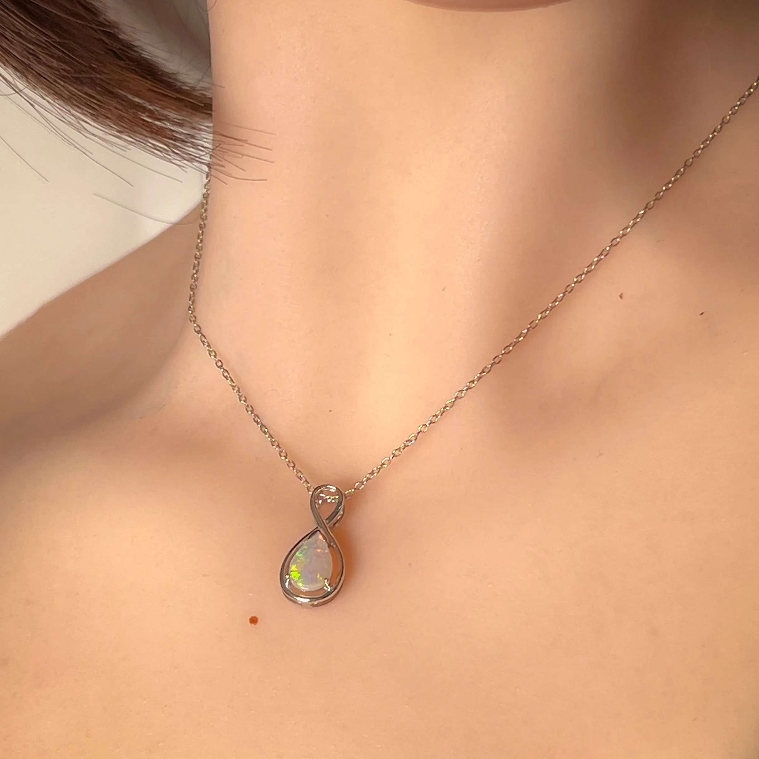 9kt White Gold Pear shape Crystal Opal 0.59ct pendant