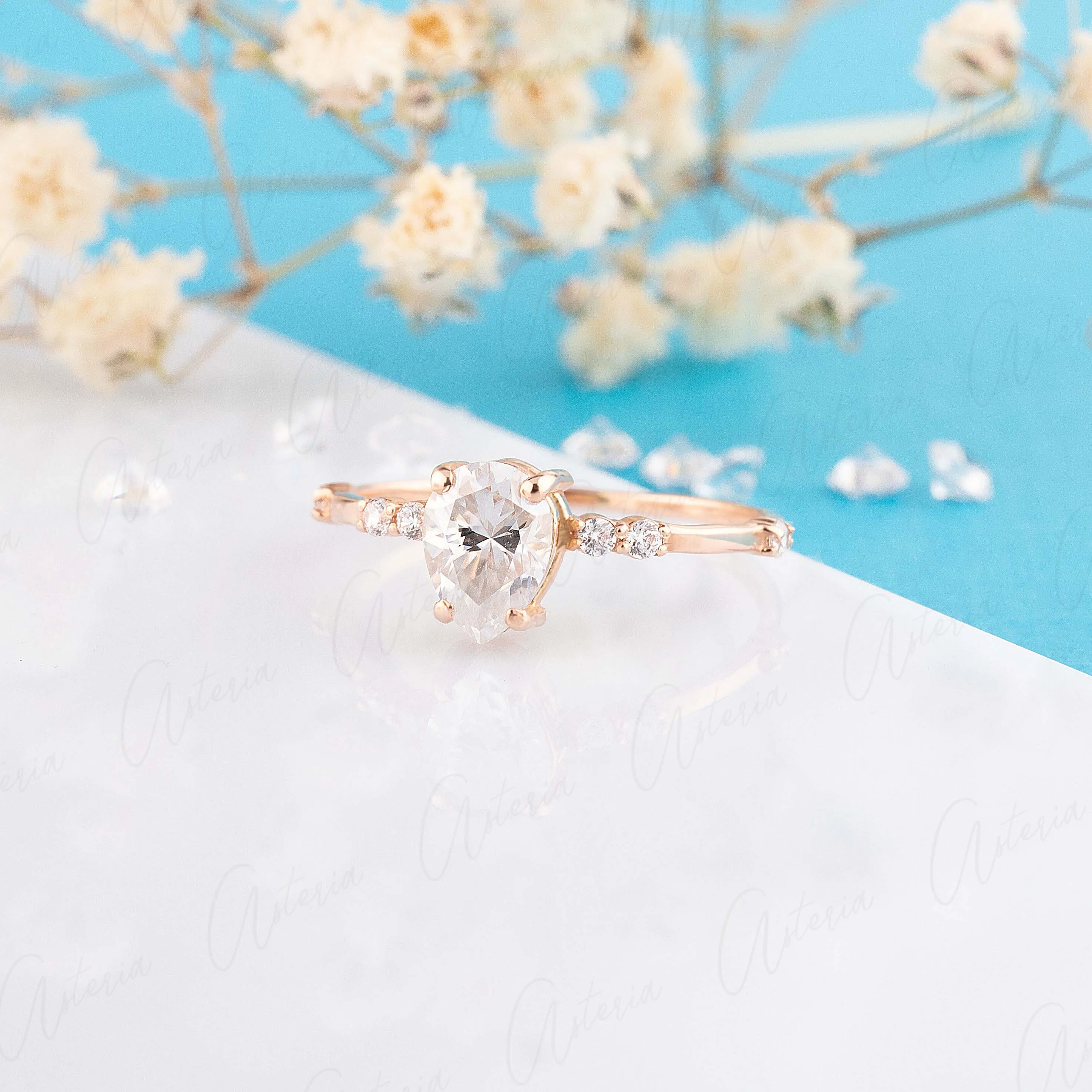 Dainty & elegant 14k rose gold pear moissanite promise ring for her