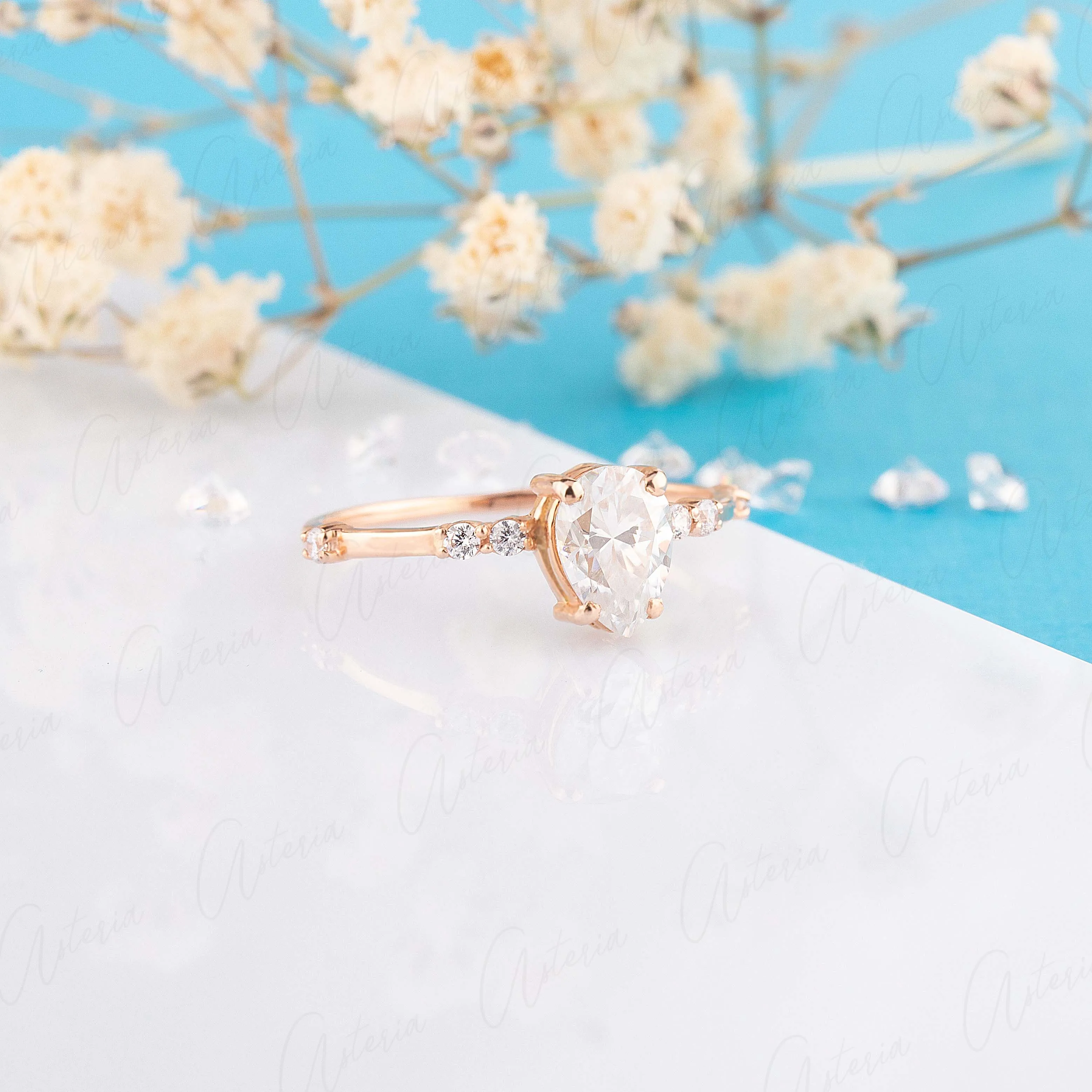 Dainty & elegant 14k rose gold pear moissanite promise ring for her