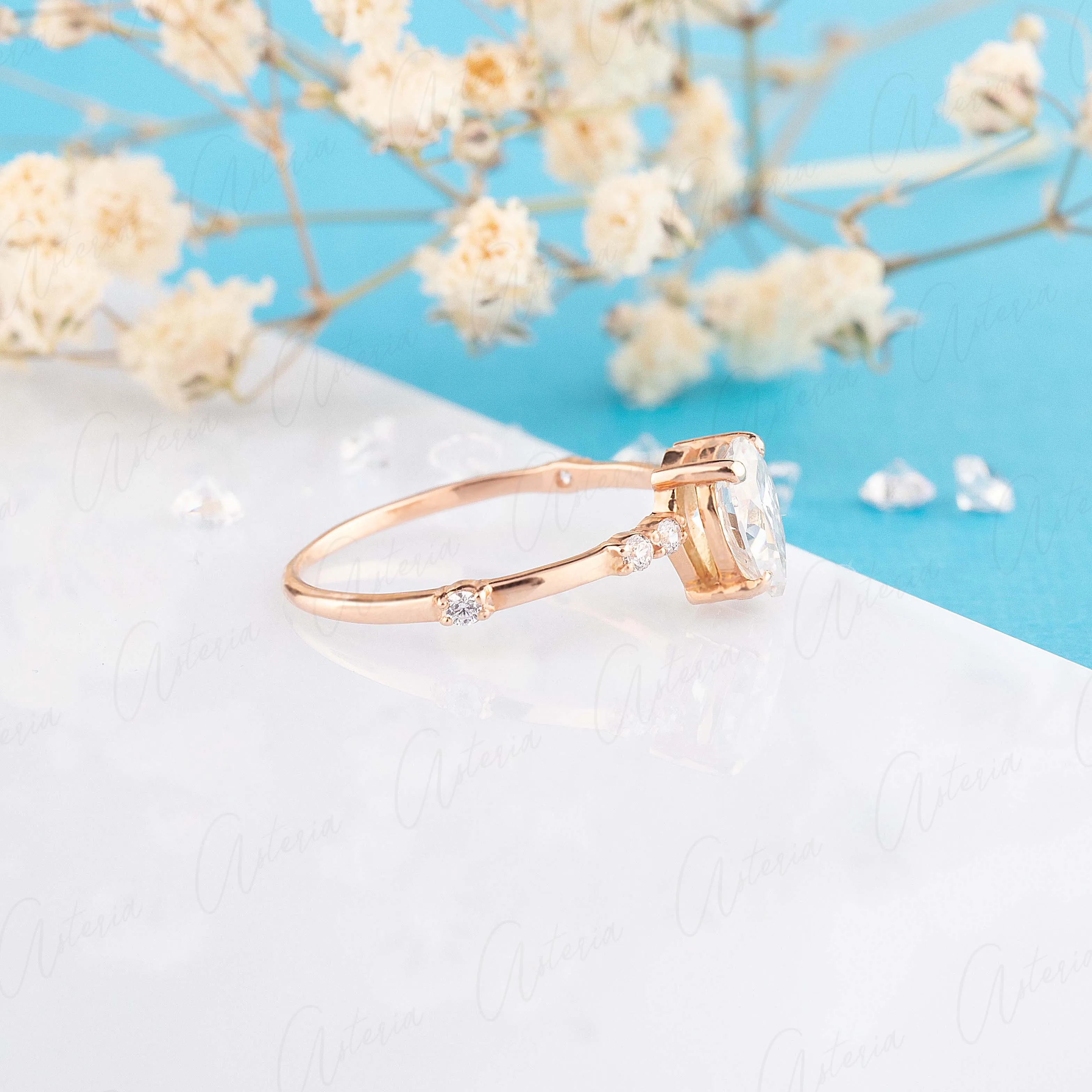 Dainty & elegant 14k rose gold pear moissanite promise ring for her