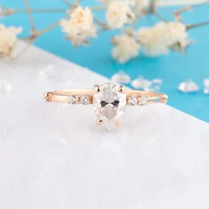Dainty & elegant 14k rose gold pear moissanite promise ring for her