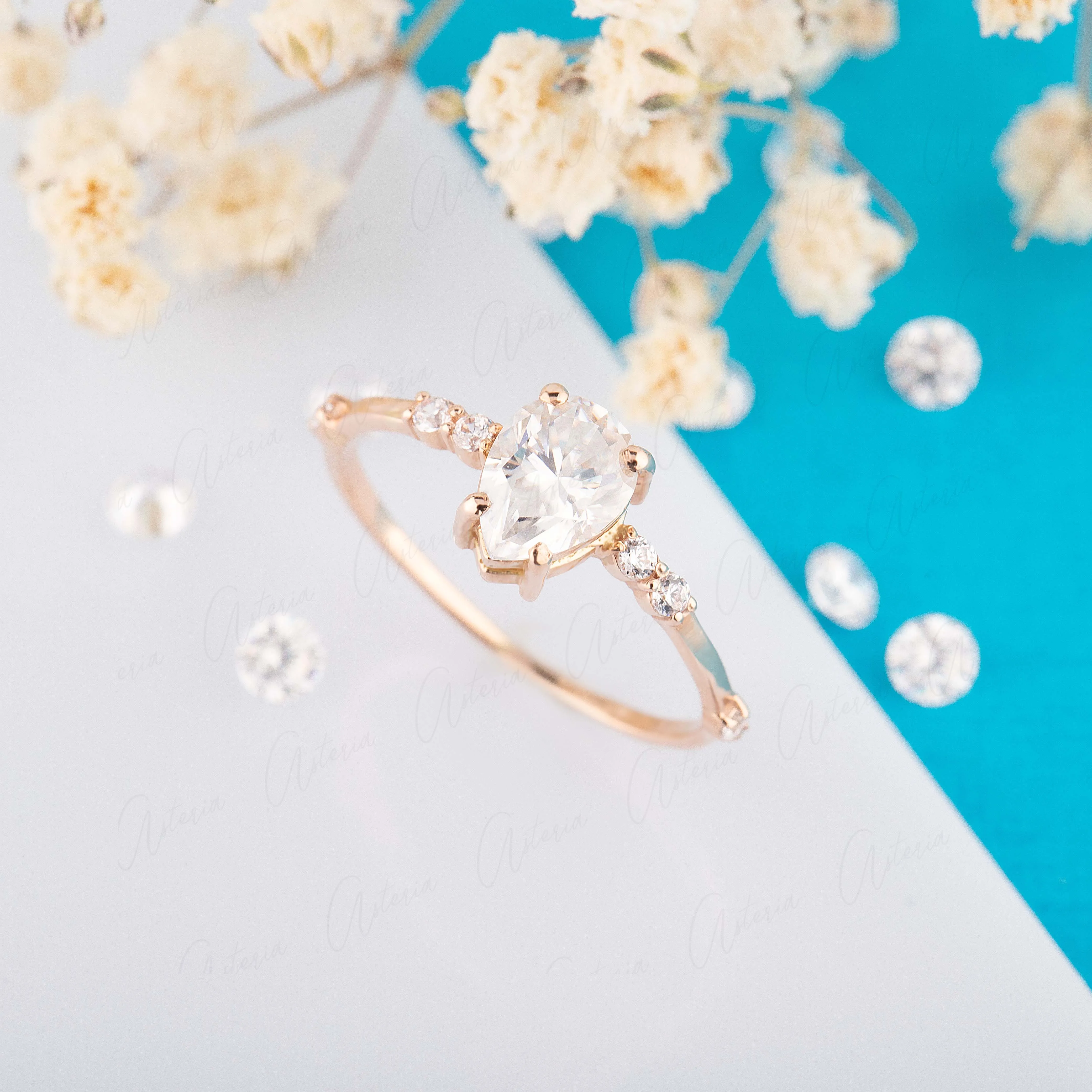 Dainty & elegant 14k rose gold pear moissanite promise ring for her