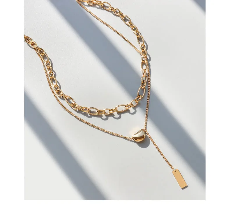 Golden Bean Tassel Necklace with Titanium Clavicle Pendant