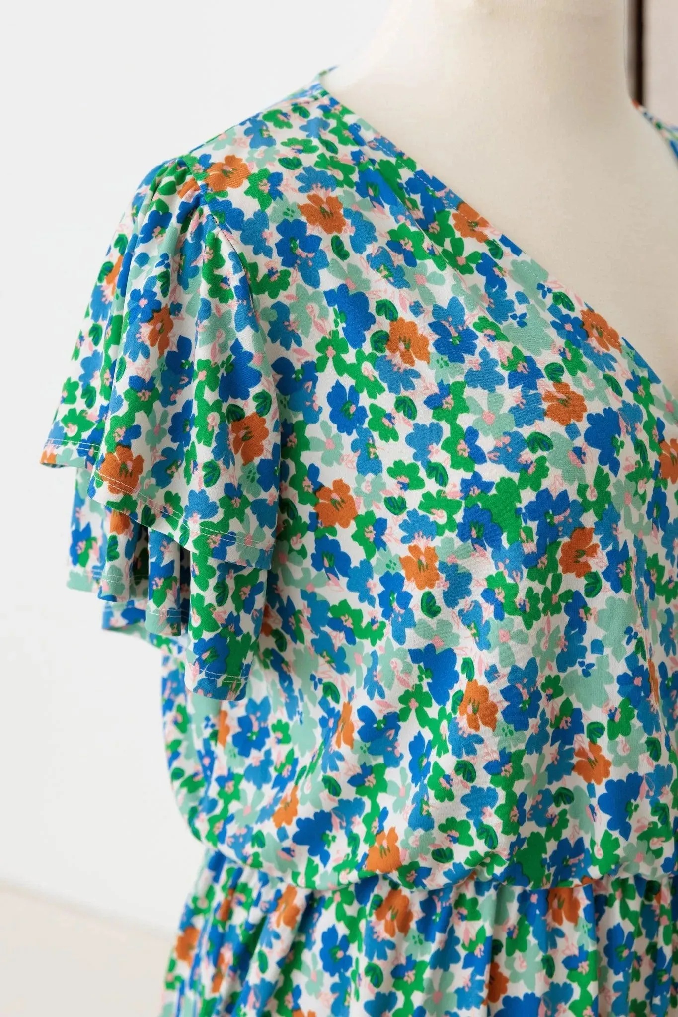Plus Size Belted Layered Ditsy Warp Romper
